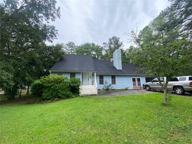 120 Coachman Dr, Anderson, SC 29625 - view of front of home with a front yard and a chimney