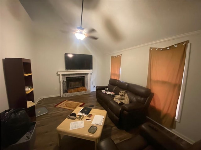 120 Coachman Dr, Anderson, SC 29625 - living area featuring ceiling fan, vaulted ceiling, a fireplace, wood finished floors, and baseboards