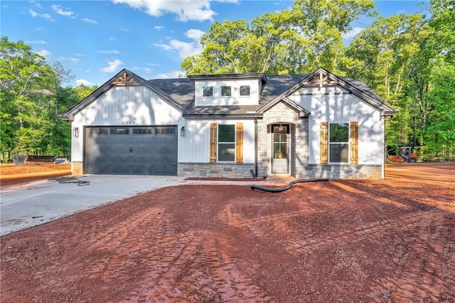 104 Hart Rd, Anderson, SC 29621 - view of front of property with driveway, a garage, and stone siding