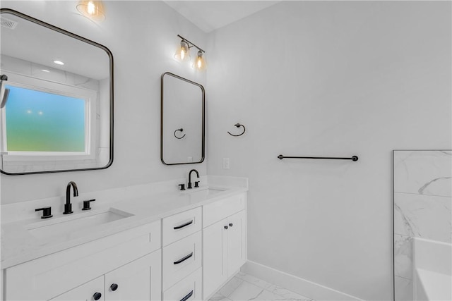 104 Hart Rd, Anderson, SC 29621 - full bathroom with marble finish flooring, double vanity, baseboards, and a tub