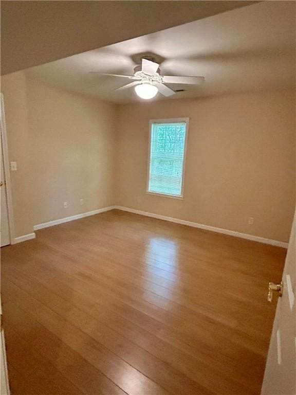 105 Eagle Ct, Westminster, SC 29693 - empty room with wood finished floors and a ceiling fan