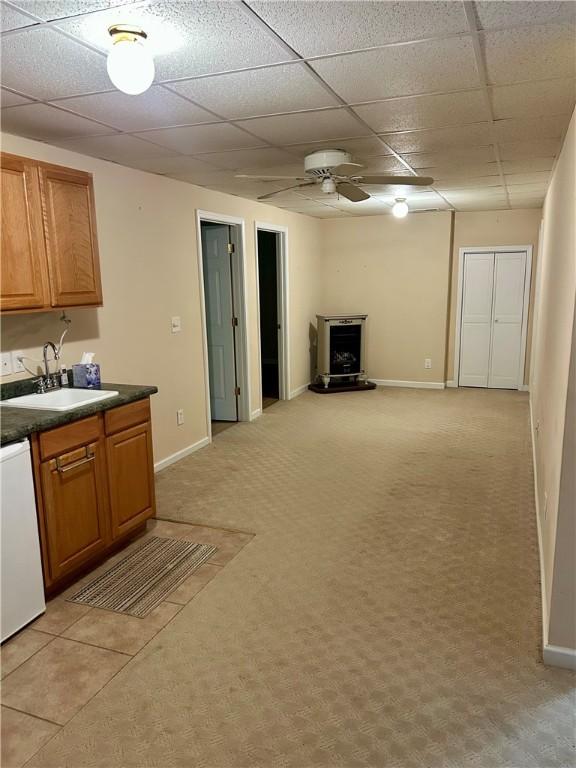 105 Eagle Ct, Westminster, SC 29693 - kitchen with a sink, ceiling fan, a drop ceiling, dishwashing machine, and dark countertops