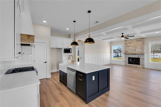 1621 Old Dobbins Bridge Rd, Townville, SC 29689 - kitchen featuring appliances with stainless steel finishes, dark cabinets, white cabinetry, light countertops, and coffered ceiling