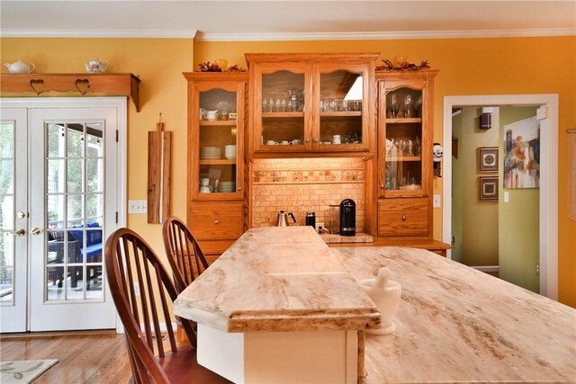 203 Tulip Tree Ct, Easley, SC 29642 - dining space featuring wood finished floors, french doors, and crown molding