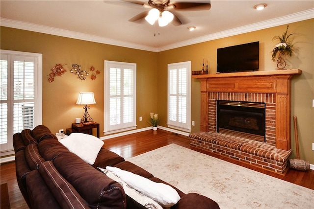203 Tulip Tree Ct, Easley, SC 29642 - living room featuring ceiling fan, wood finished floors, baseboards, and ornamental molding