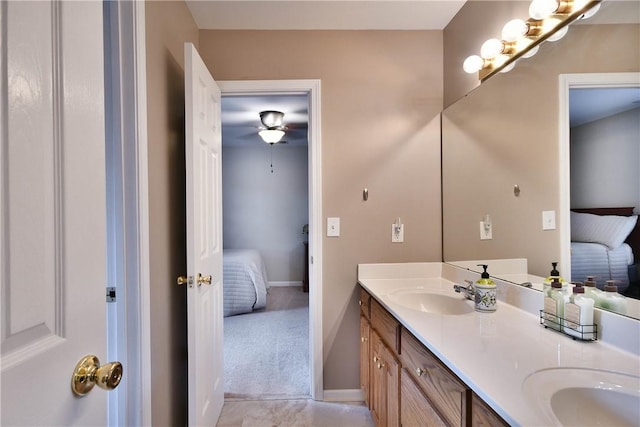203 Tulip Tree Ct, Easley, SC 29642 - bathroom featuring ensuite bath, double vanity, baseboards, and ceiling fan
