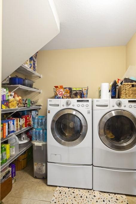 6352 Valley Farm Rd, Seneca, SC 29678 - laundry area featuring washing machine and clothes dryer and light tile patterned floors