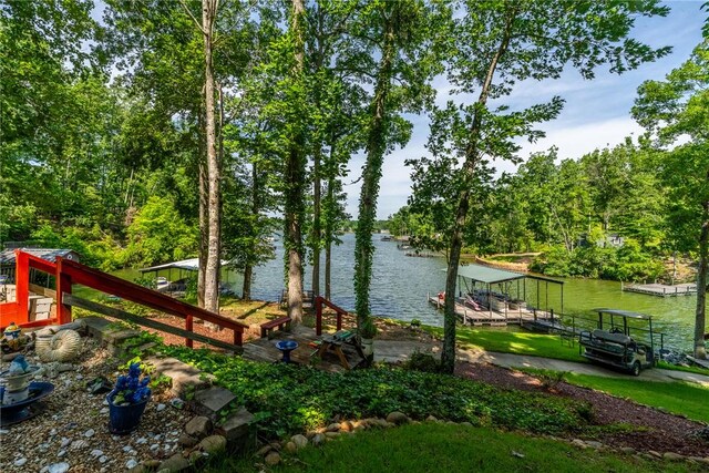 79 Blue Heron Cv, Abbeville, SC 29620 - view of yard with a water view and a boat dock