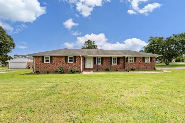 2909 Olive St, Anderson, SC 29625 - ranch-style home featuring a detached garage, a front yard, and brick siding