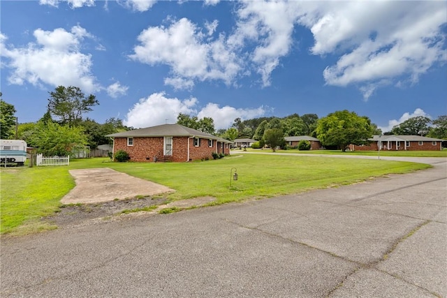 2909 Olive St, Anderson, SC 29625 - view of side of property featuring brick siding and driveway