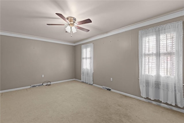 2909 Olive St, Anderson, SC 29625 - carpeted spare room featuring crown molding and a ceiling fan