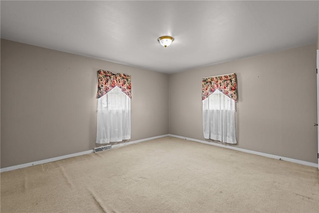 2909 Olive St, Anderson, SC 29625 - carpeted spare room with baseboards