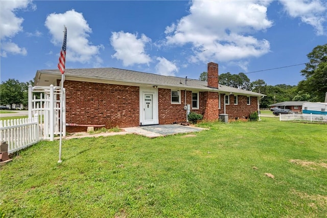 2909 Olive St, Anderson, SC 29625 - rear view of house featuring a chimney and brick siding