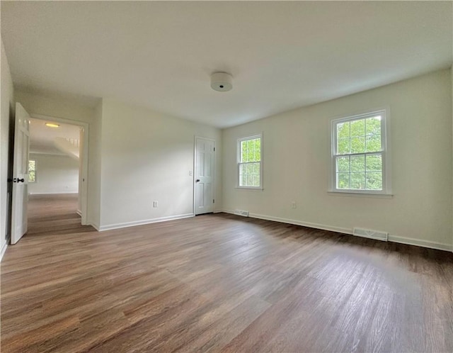 102 Buckingham Ct, Easley, SC 29640 - spare room featuring wood finished floors and baseboards