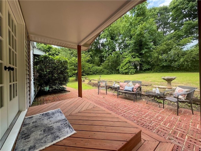 102 Buckingham Ct, Easley, SC 29640 - wooden deck with outdoor lounge area, a yard, view of wooded area, and a patio area