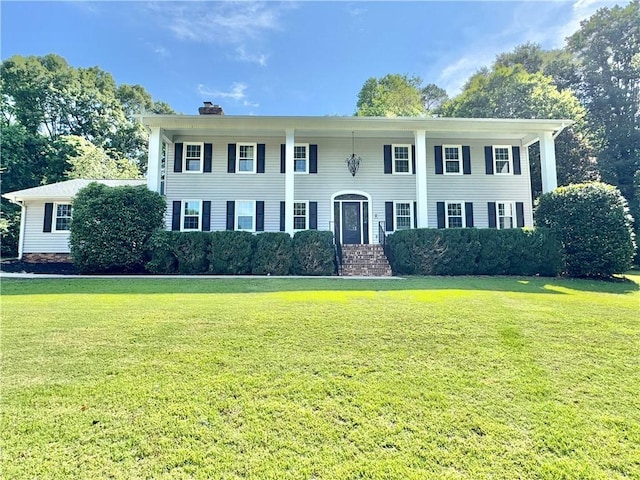 102 Buckingham Ct, Easley, SC 29640 - colonial home featuring a chimney and a front lawn