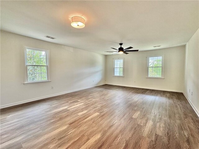102 Buckingham Ct, Easley, SC 29640 - unfurnished room with dark wood-type flooring, baseboards, and a ceiling fan
