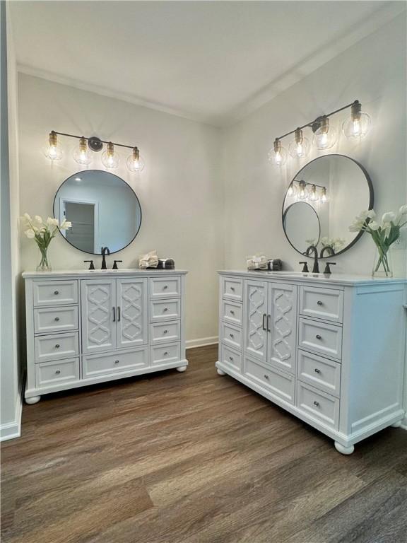 102 Buckingham Ct, Easley, SC 29640 - full bath featuring vanity, wood finished floors, and baseboards