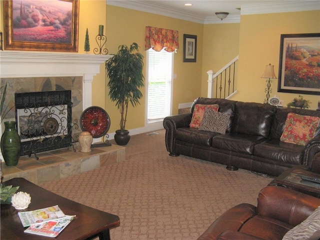 307 Holly Ridge Dr, Anderson, SC 29621 - carpeted living room with ornamental molding, stairs, a tiled fireplace, and recessed lighting