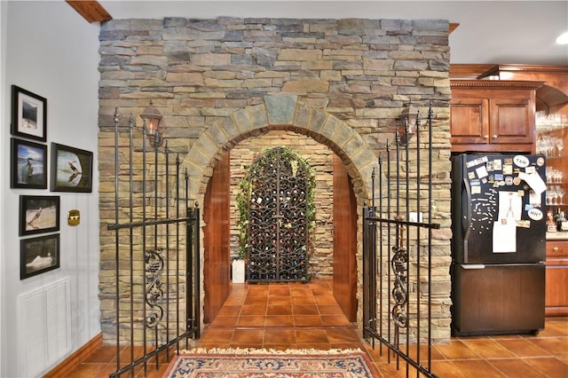 405 Windcrest Ct, Salem, SC 29676 - wine room with arched walkways and tile patterned flooring