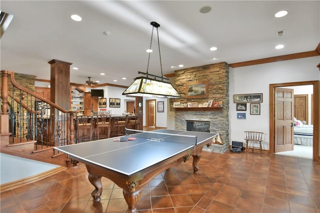 405 Windcrest Ct, Salem, SC 29676 - rec room with a stone fireplace, ornamental molding, recessed lighting, and tile patterned floors