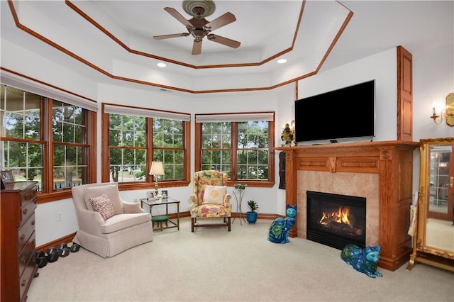 405 Windcrest Ct, Salem, SC 29676 - sitting room with carpet floors, a glass covered fireplace, a ceiling fan, a raised ceiling, and recessed lighting