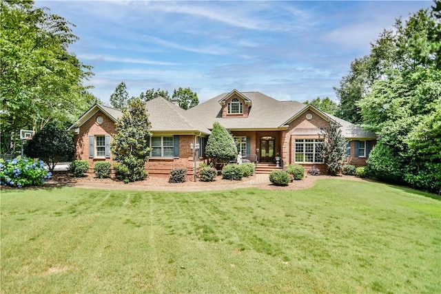 405 Windcrest Ct, Salem, SC 29676 - view of front facade with a front yard, brick siding, and covered porch