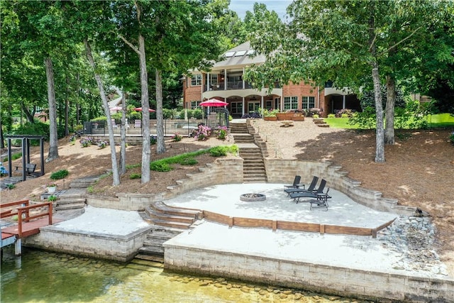 405 Windcrest Ct, Salem, SC 29676 - dock area featuring stairway, a fire pit, a water view, and a patio