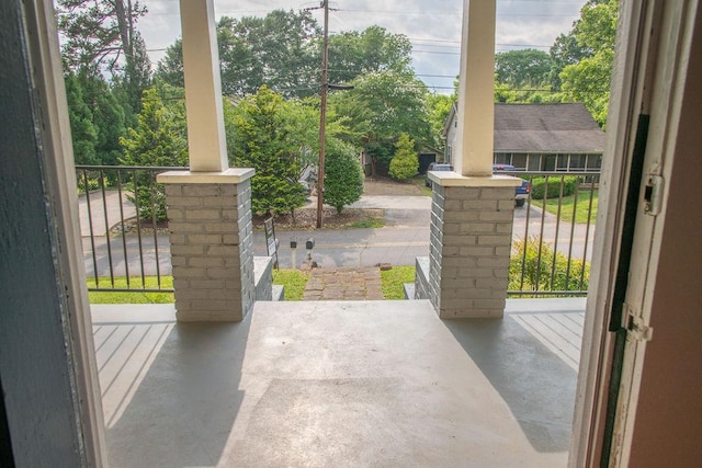 200 Bulwinkle Dr, Walhalla, SC 29691 - doorway featuring concrete flooring, ornate columns, and plenty of natural light