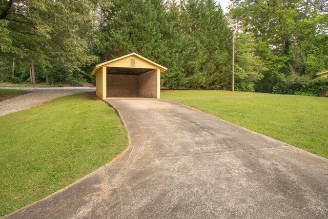 200 Bulwinkle Dr, Walhalla, SC 29691 - garage with driveway and a detached carport