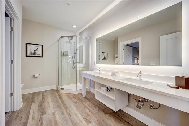 13500 Clemson Blvd Unit 2410, Seneca, SC 29678 - bathroom featuring a shower stall, wood finished floors, and double vanity
