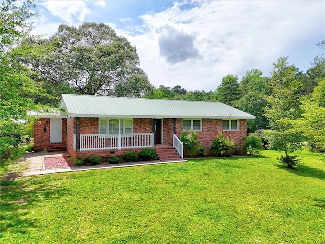 440 Cooley Bridge Rd, Pelzer, SC 29669 - ranch-style home featuring a porch, a front yard, brick siding, and a metal roof