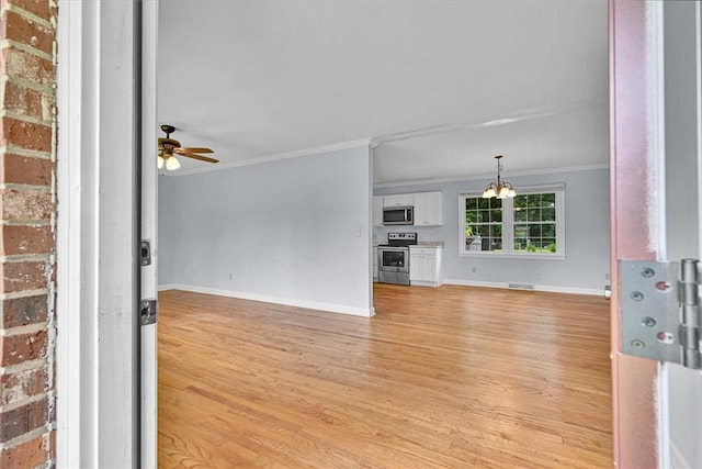 440 Cooley Bridge Rd, Pelzer, SC 29669 - unfurnished living room with ornamental molding, light wood-type flooring, a chandelier, and a ceiling fan