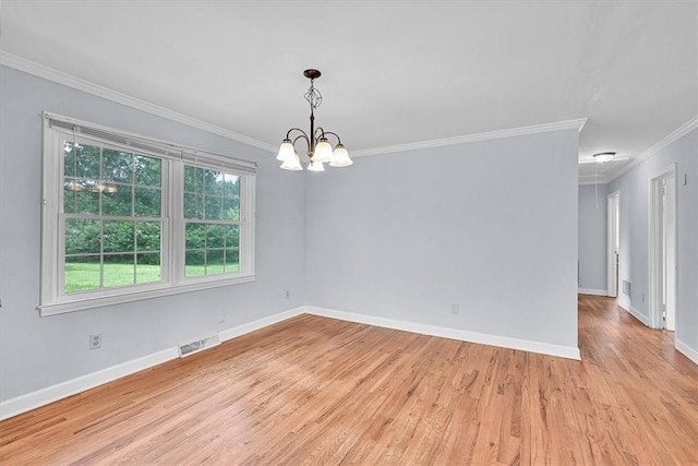 440 Cooley Bridge Rd, Pelzer, SC 29669 - spare room featuring a chandelier, crown molding, and light wood-style floors