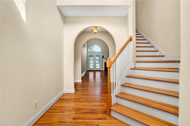 10 Laurelcrest Ln, Travelers Rest, SC 29690 - foyer entrance featuring arched walkways, wood finished floors, and stairway