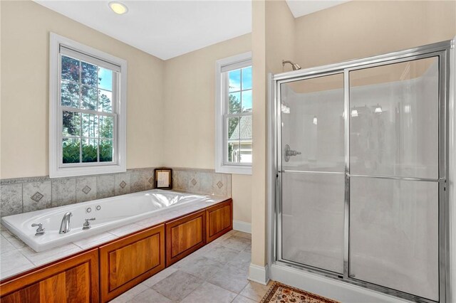 10 Laurelcrest Ln, Travelers Rest, SC 29690 - full bathroom with a bath, a stall shower, and tile patterned floors