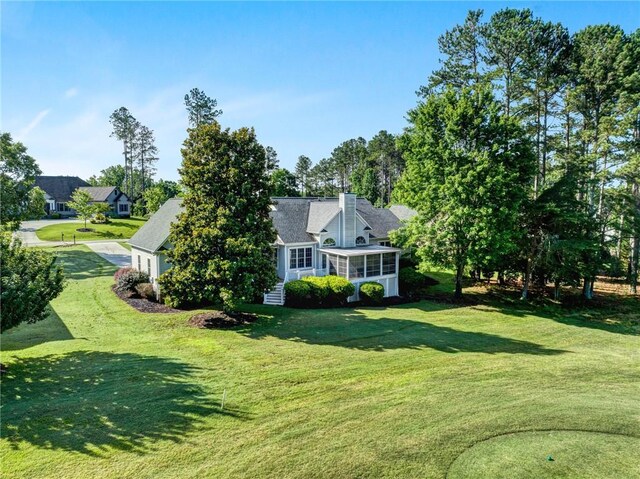 10 Laurelcrest Ln, Travelers Rest, SC 29690 - view of grassy yard with a sunroom