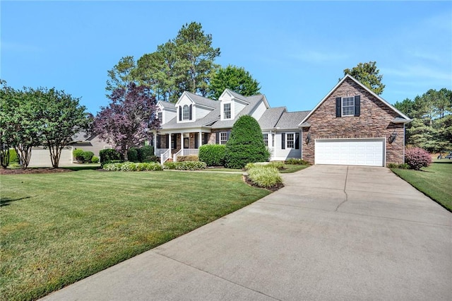 10 Laurelcrest Ln, Travelers Rest, SC 29690 - view of front of home with concrete driveway, a front lawn, stone siding, and a garage