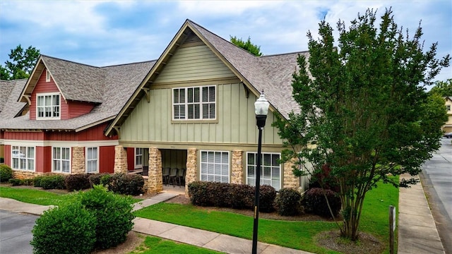 101 W Ln Unit 1118, Clemson, SC 29631 - view of front of house with a shingled roof, board and batten siding, stone siding, and a front yard