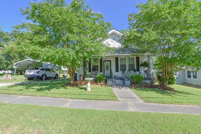 102 Langely St, Abbeville, SC 29620 - obstructed view of property with a porch, a carport, and a front yard