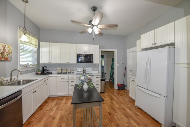 102 Langely St, Abbeville, SC 29620 - kitchen with white appliances, ceiling fan, white cabinets, and light wood-style floors
