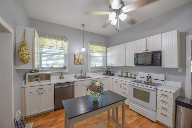 102 Langely St, Abbeville, SC 29620 - kitchen featuring black microwave, white range with electric cooktop, stainless steel dishwasher, a ceiling fan, and white cabinets