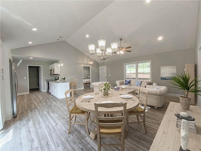 325 Code Cir, Seneca, SC 29678 - dining area featuring a chandelier, recessed lighting, light wood-style flooring, high vaulted ceiling, and ceiling fan