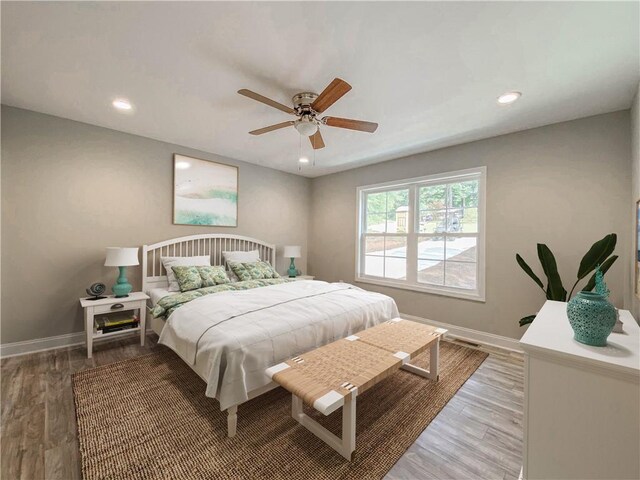 325 Code Cir, Seneca, SC 29678 - bedroom with light wood finished floors, recessed lighting, and ceiling fan