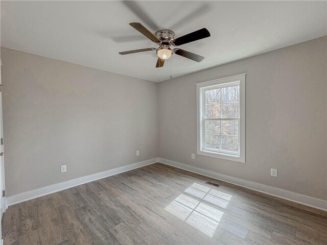 325 Code Cir, Seneca, SC 29678 - spare room featuring a ceiling fan and wood finished floors