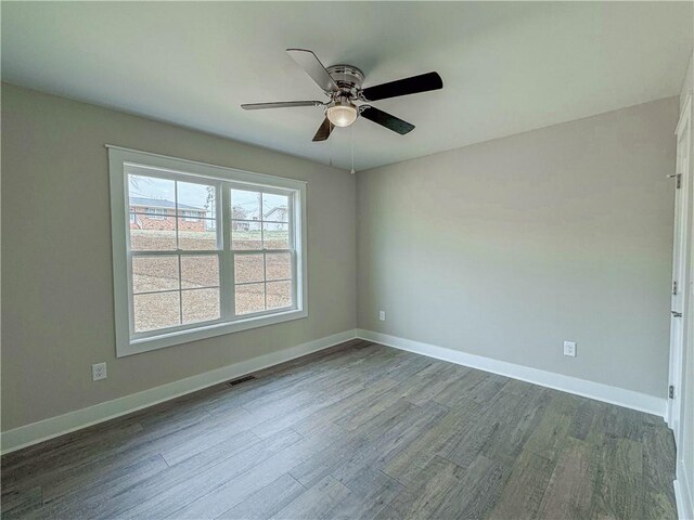 325 Code Cir, Seneca, SC 29678 - empty room featuring dark wood-style floors and ceiling fan