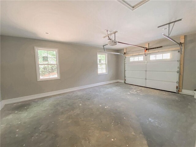 325 Code Cir, Seneca, SC 29678 - garage with baseboards and a garage door opener