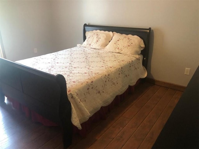 431 Seigler Rd, Iva, SC 29655 - bedroom featuring dark wood-style flooring and baseboards