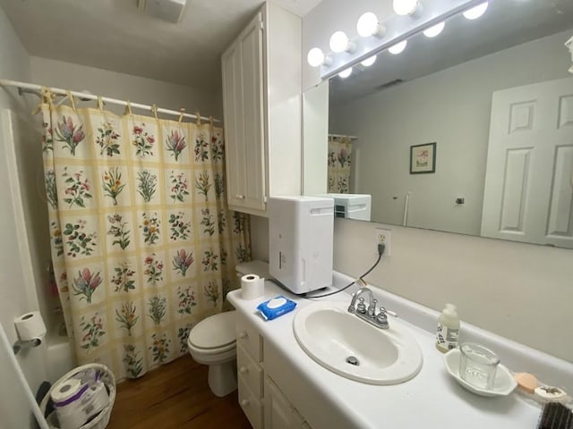 621 Chase Lndg, Martin, GA 30557 - full bath with vanity, wood finished floors, and shower / tub combo