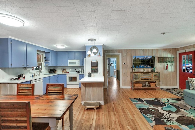 197 Jubie Ln, Seneca, SC 29672 - kitchen with blue cabinetry, white appliances, light countertops, open shelves, and light wood finished floors